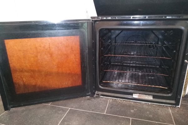 dirty door of a oven