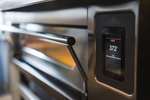 A modern oven for baking pizza in a restaurant
