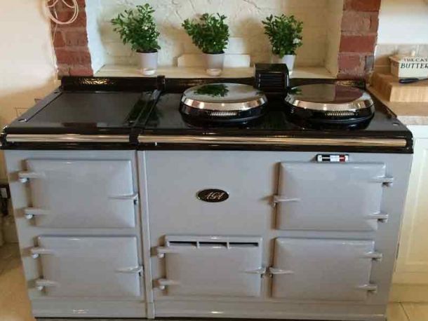 Grey AGA cooker wityh a black top