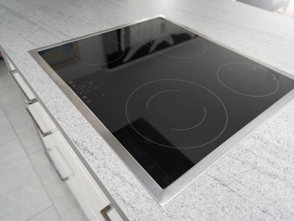 Modern built-in induction cooker in the kitchen